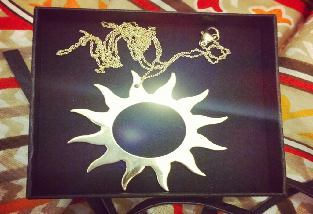Rapunzel sun necklace